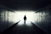 image of entrance  - silhouette in a subway tunnel - JPG 