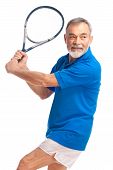 stock photo of man  - senior man playing tennis - JPG 