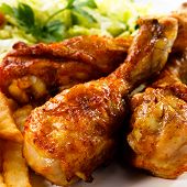picture of objects  - Grilled chicken legs with chips and vegetables - JPG 