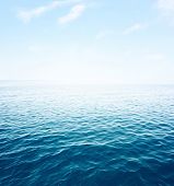 foto of blue  - Blue sea with waves and clear blue sky - JPG 