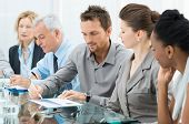 stock photo of meeting  - Group Of Business People Are Focused On The Job - JPG 
