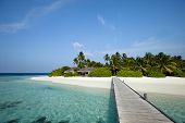 picture of paradise  - A wood pontoon access to paradise beach of a tropical island - JPG 