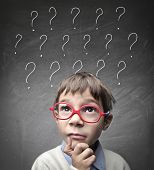 foto of children  - Child with many question marks - JPG 