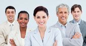 pic of business people  - International business people standing with folded arms smiling at the camera - JPG 