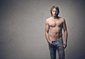 pic of guy  - handsome guy shirtless on a gray background - JPG 