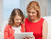 image of pre  - picture of mother and daughter with tablet pc - JPG 