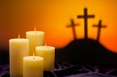 pic of religion  - Three crosses symbolic for Jesus crucifixion in Golgotha and candles of hope - JPG 