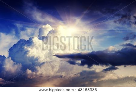 Picture or Photo of Overcast sky before storm. Dark ominous clouds at sunset.