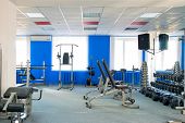 foto of gym  - Room with gym equipment in the sport club - JPG 