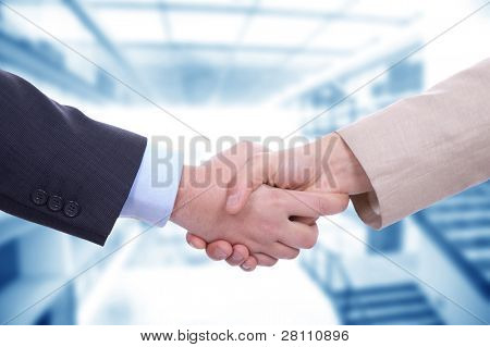 Picture or Photo of Business men in a handshake at the office