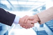 picture of handshake  - Business men in a handshake at the office - JPG 