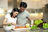 stock photo of time  - Asian Family spending time together in the kitchen - JPG 