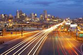 image of landmark  - Image of Denver and busy street with traffic leading to the city - JPG 