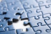 pic of puzzle  - abstract puzzle background with one piece missing
 - JPG 