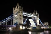 picture of bridge  - Tower Bridge at night with its drawbridge open on the River Thames in Tower Hamlets - JPG 