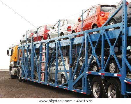 Picture or Photo of Brand-new cars on a car transport truck