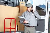 pic of industrial  - Happy professional shipping courier - JPG 
