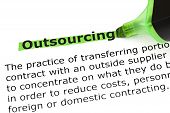 image of workforce  - Definition of the word Outsourcing highlighted in green with felt tip pen - JPG 