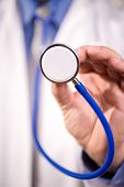 image of medical doctors  - man as medical doctor or related field holding stethoscope - JPG 