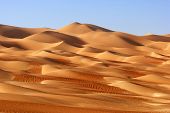 stock photo of tranquil  - A dune landscape in the Rub al Khali or Empty Quarter - JPG 