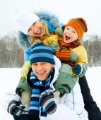 picture of family  - happy young family spending time outdoor in winter park - JPG 
