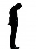 image of man  - one caucasian business man sad lonely silhouette standing Full length in studio isolated on white background - JPG 