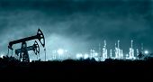 foto of group  - Group oil rigs and brightly lit industrial site at night - JPG 