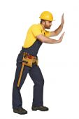 stock photo of construction worker  - handyman in push position isolated on white background suitable for composition - JPG 