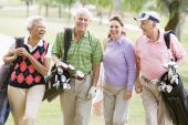 pic of golf  - Portrait Of Four Friends Enjoying A Game Golf - JPG 