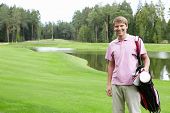 pic of golf  - A young man on the golf course - JPG 