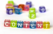 foto of technology concept  - Text Content on colorful wooden cubes over white - JPG 