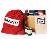stock photo of food  - A large bag of beans a box of powdered milk and multiple containers of non - JPG 