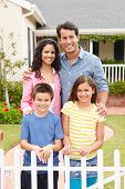 picture of family  - Hispanic family outside home - JPG 