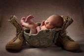stock photo of infants  - Newborn infant in father - JPG 
