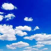 picture of blue sky  - Beautiful white fluffy clouds in the blue sky - JPG 