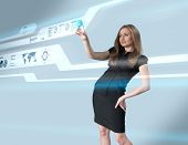 stock photo of future technology  - Lady touching hi - JPG 