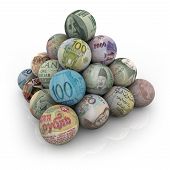 stock photo of currency  - A pyramid of balls representing world currencies - JPG 
