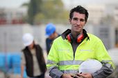 foto of construction worker  - Portrait of a young worker on a site - JPG 