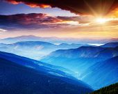 pic of sunset  - Majestic sunset in the mountains landscape - JPG 