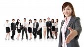 picture of handshake  - Smiling business executive woman of Asian make a handshake with you in front of her team isolated on white background - JPG 