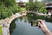 stock photo of  photo  - Taking Pictures with smartphone in Hong Kong - JPG 