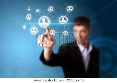 Picture or Photo of A businessman working on modern technology, selective focus