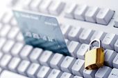 stock photo of security  - Credit card and lock on the keyboard - JPG 