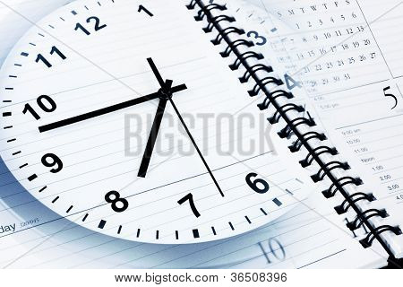 Picture or Photo of Clock face, calendar and diary page