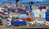 picture of transportation  - truck transport container to a warehouse near the sea - JPG 