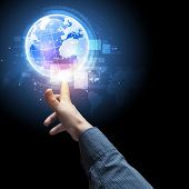 stock photo of earth  - Human hand holding our planet earth glowing - JPG 