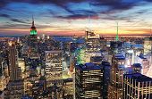 stock photo of sunset  - New York City skyline with urban skyscrapers at sunset - JPG 