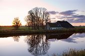picture of sunset  - Dutch farm house by canal at sunset - JPG 
