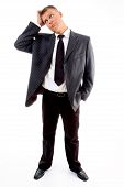 foto of business people  - standing young confused businessman against white background - JPG 