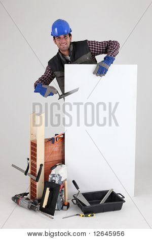 Picture or Photo of Mason with construction equipment